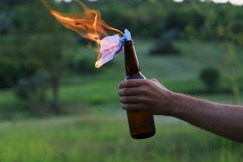 A burning Molotov cocktail