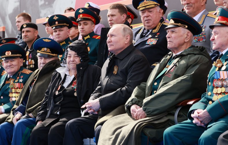 Russian President Vladimir Putin watches the parade