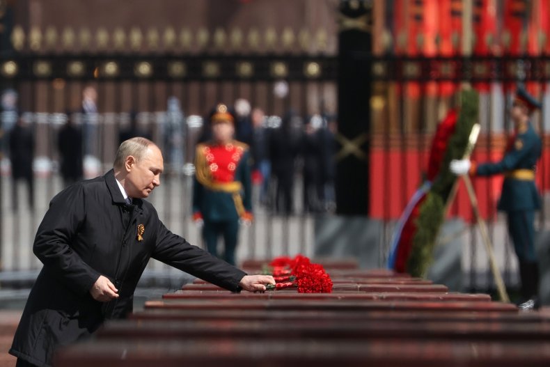 Putin attends a wreath-laying on Victory Day