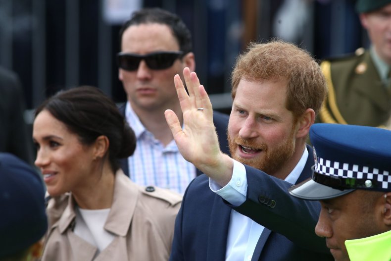 Harry, Meghan Flanked by Police