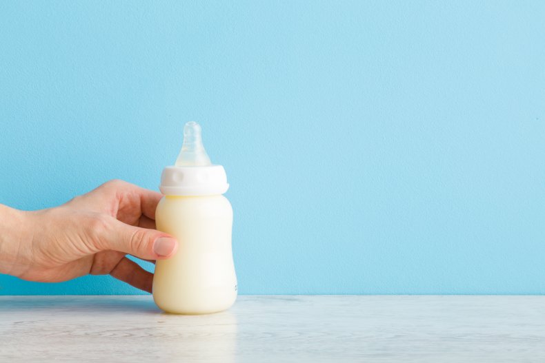 A bottle filled with baby formula