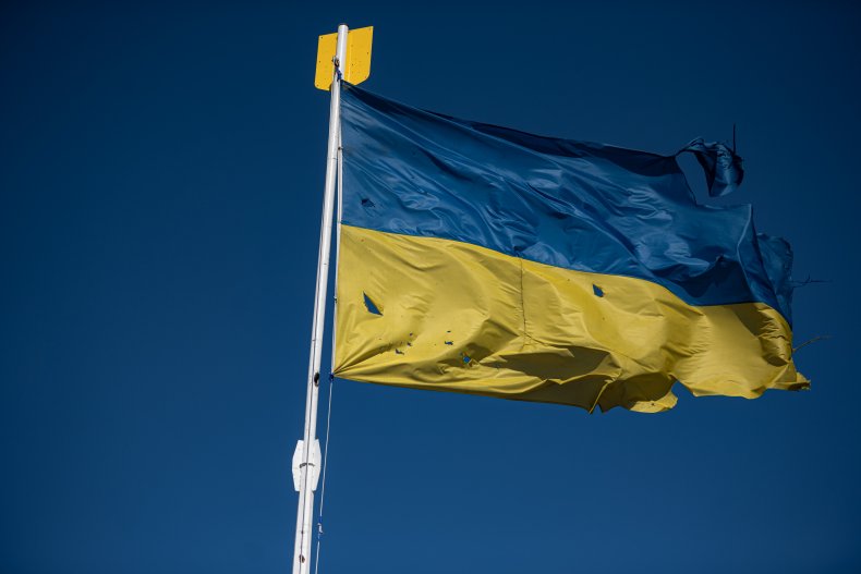 A bullet riddled Ukrainian flag
