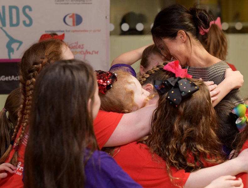 Meghan Markle Hugs Children on Cardiff Visit