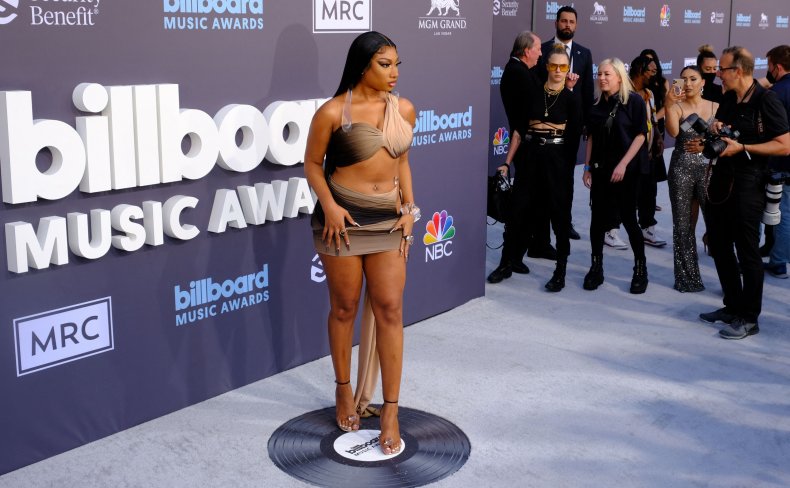 Megan Thee Stallion watched by Cara Delevingne