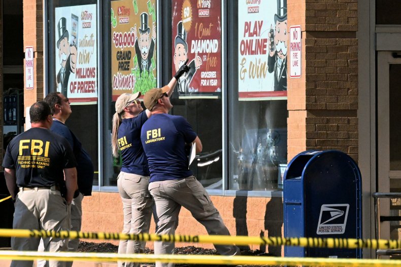 FBI agents look at bullet impacts 