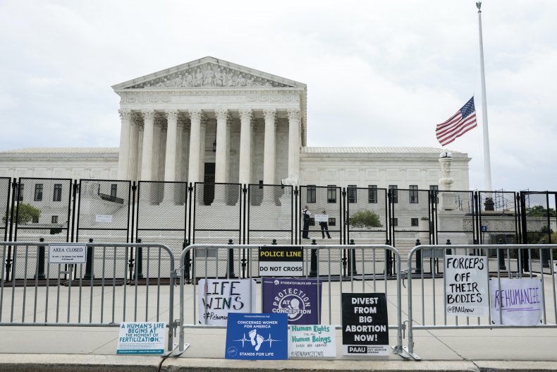 Supreme Court protest signs
