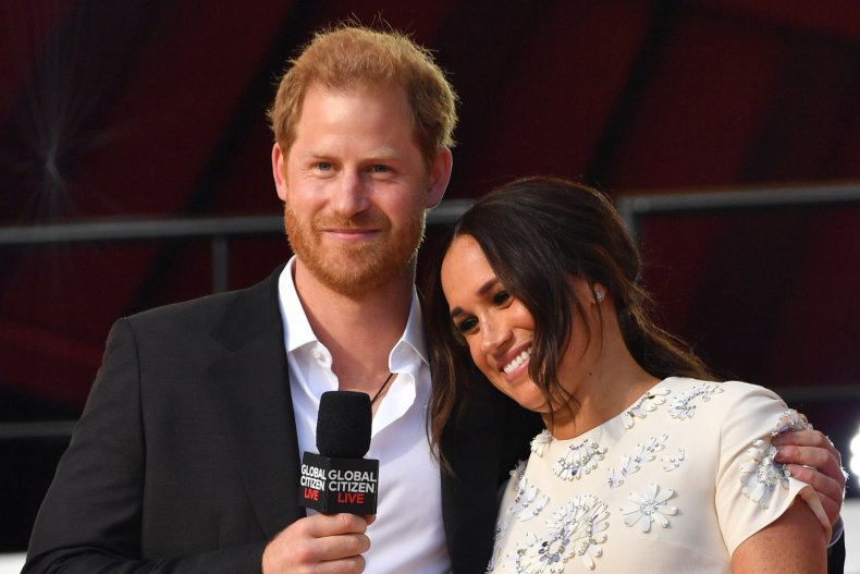 Prince Harry Puts Arm Around Meghan