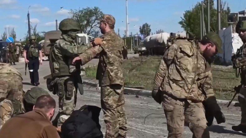 p265 militants laid down their arms and surrendered, including 51 seriously wounded who were taken for treatment to a hospital in the city of Novoazovsk, in May 2022. (Ministry of Defense of Russia/Zenger)/p