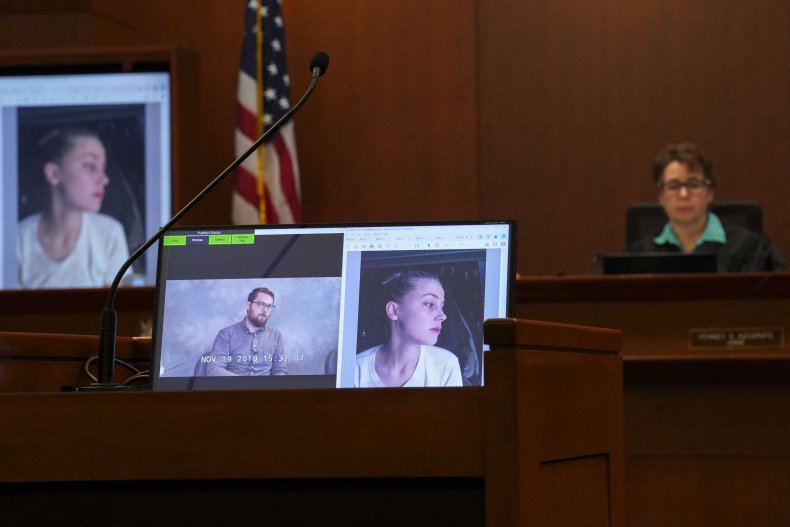 Judge Looks at Photos of Heard