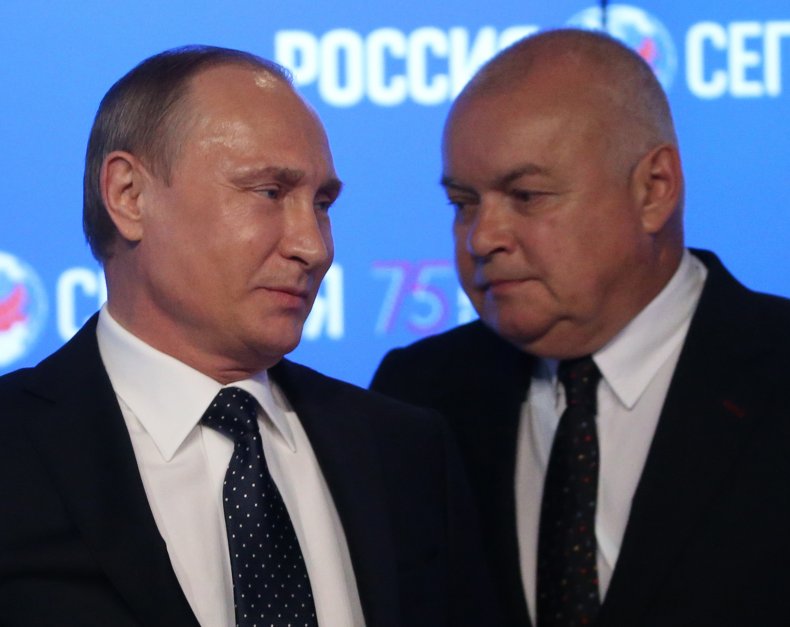 TV host Dmitry Kiselyov with Vladimir Putin