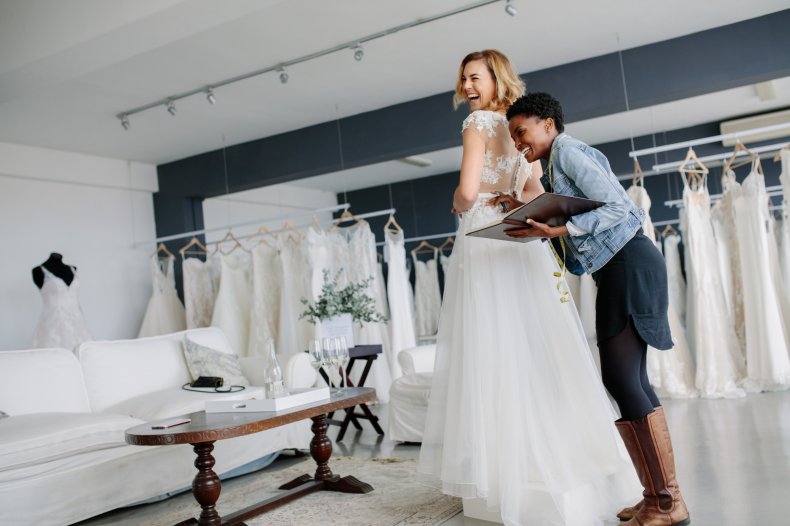 Bride-to-be trying on wedding dress