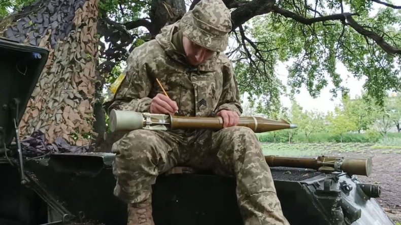 Ukrainian soldier paints missile for Embroidery Day