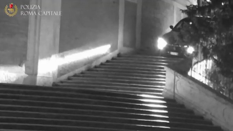Man drives down Spanish Steps in Rome