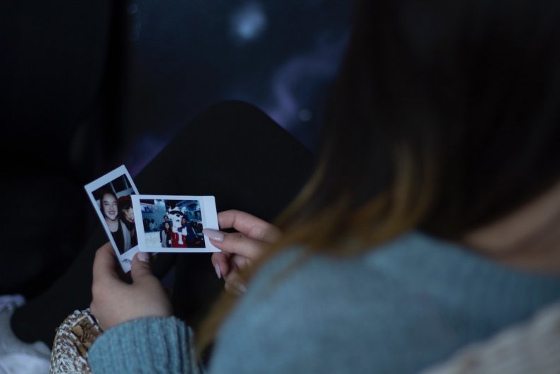 Woman looking at pictures
