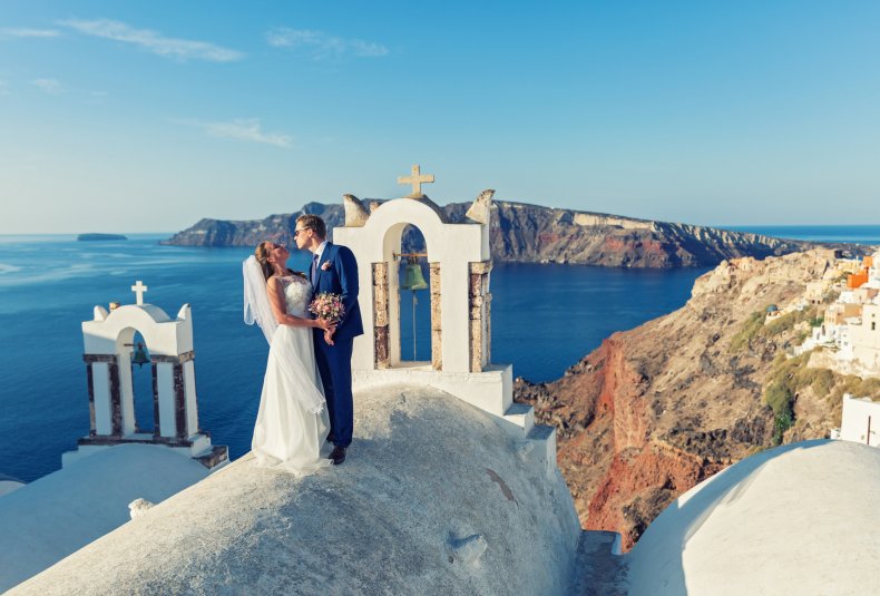 Newly weds in Santorini, Greece