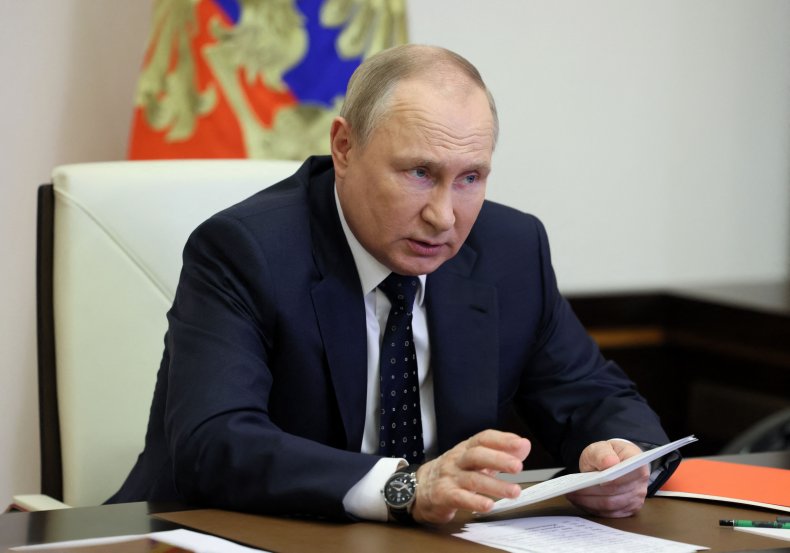 Vladimir Putin speaks during a meeting 
