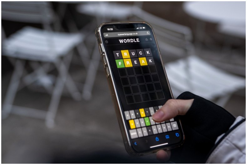 Photo of woman playing Wordle