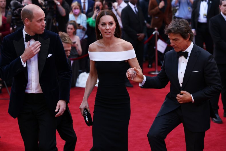 Tom Cruise Takes Kate Middleton's Hand