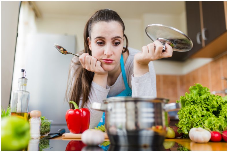 A woman annoyed with her cooking