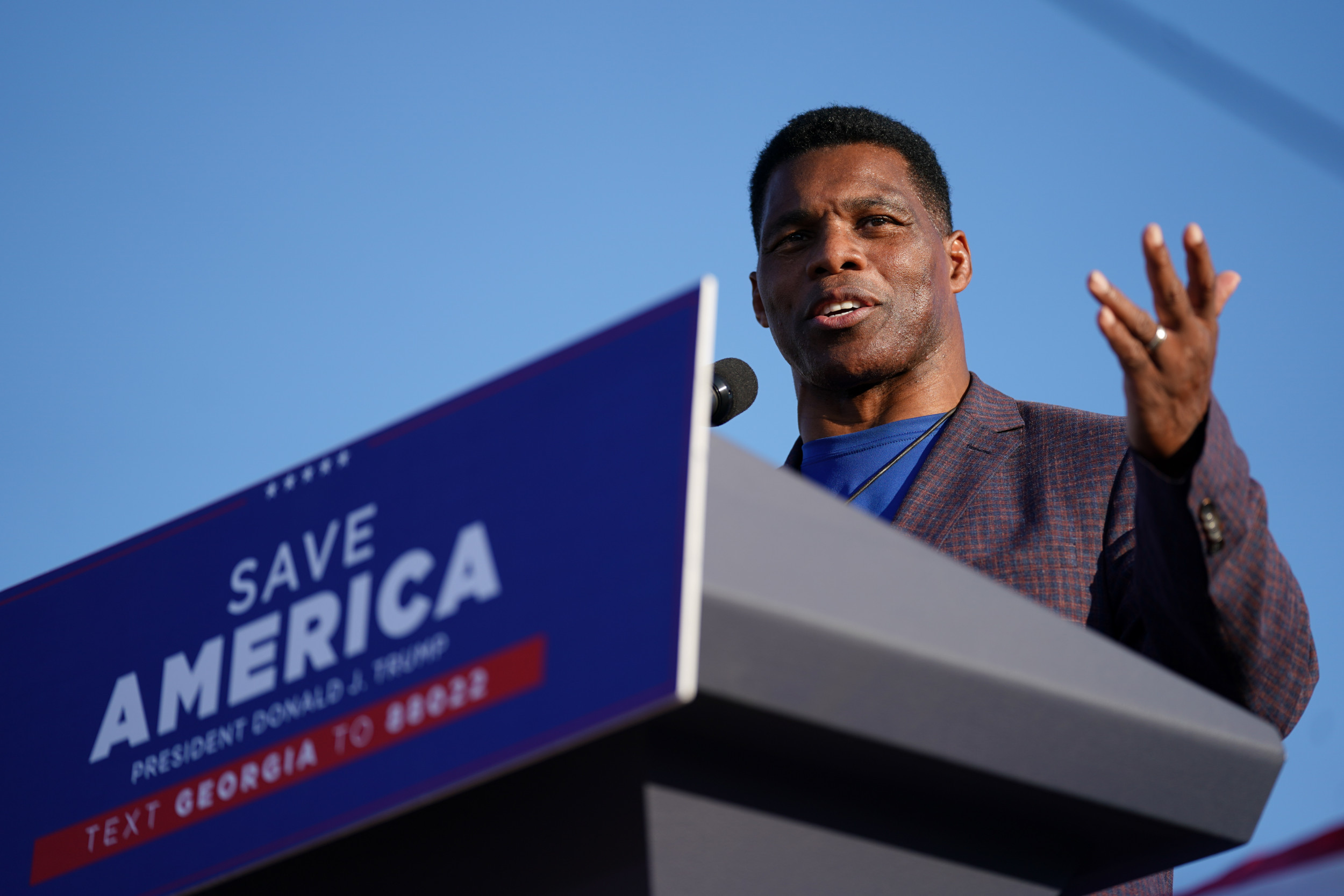 Trump-Backed Herschel Walker, Who Questioned Evolution, Wins in Georgia