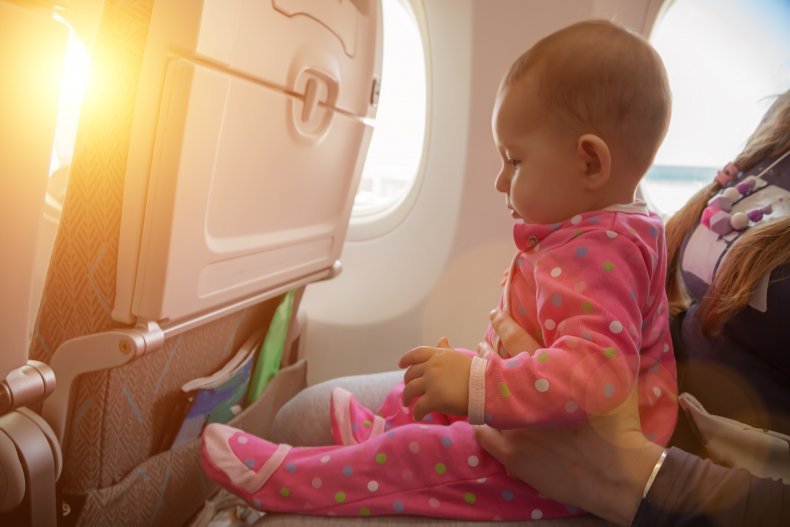 baby plane airplane seat legroom travel aita 