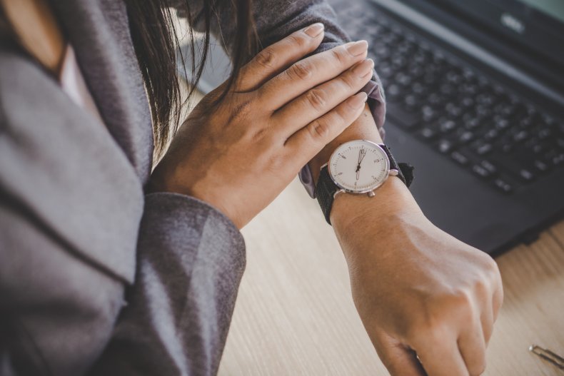 Woman checking her watch