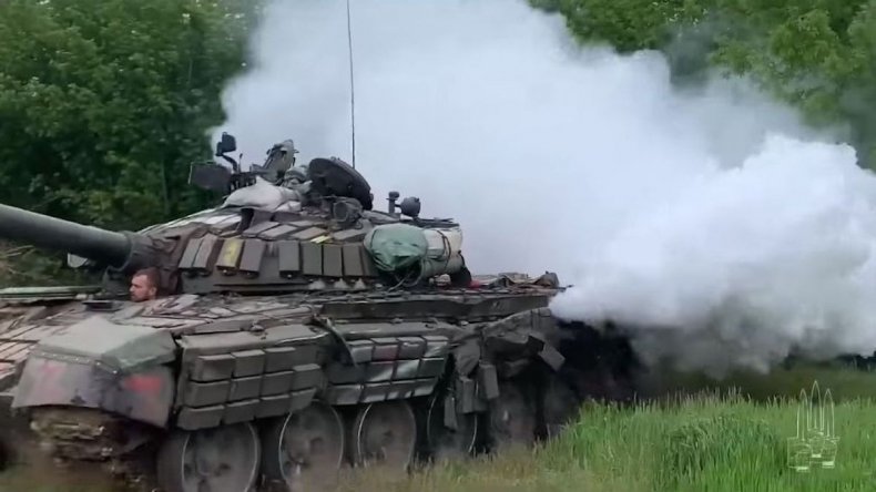 Ukraine troops take Russian tanks as trophies