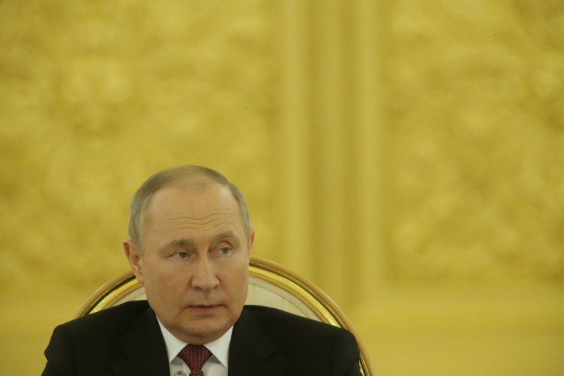 Vladimir Putin pictured in Kremlin meeting May