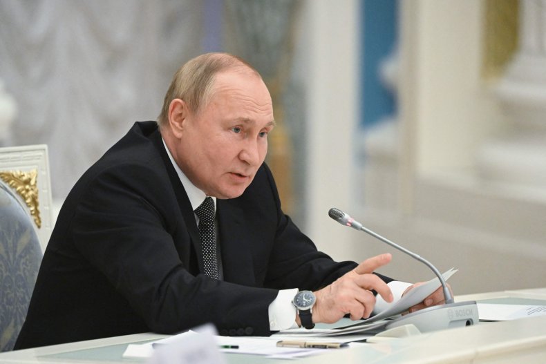 Vladimir Putin speaks during a Kremlin session