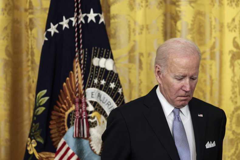 U.S. President Joe Biden listens as U.S. 