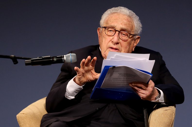 Henry Kissinger attends a ceremony