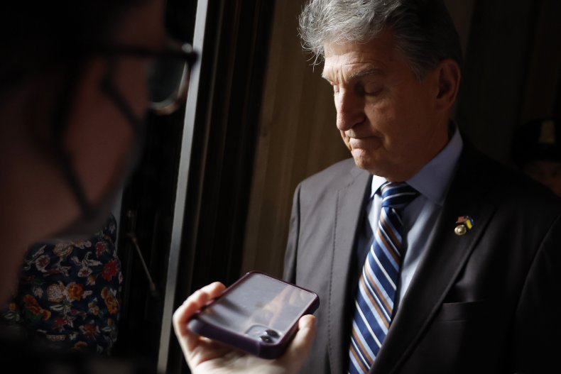 Senator Joe Manchin talks to reporters