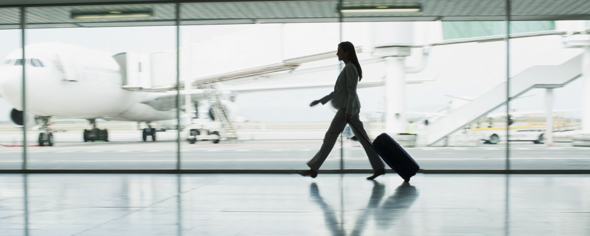 Woman boarding plane