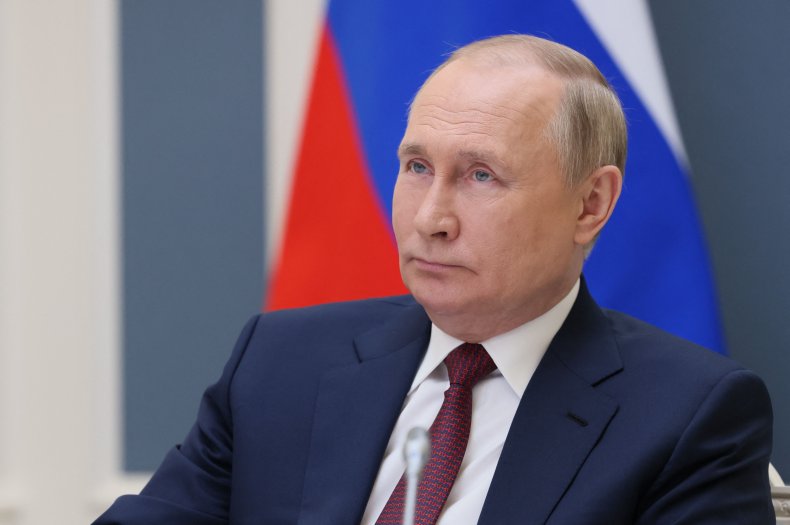 Vladimir Putin takes part in a forum.