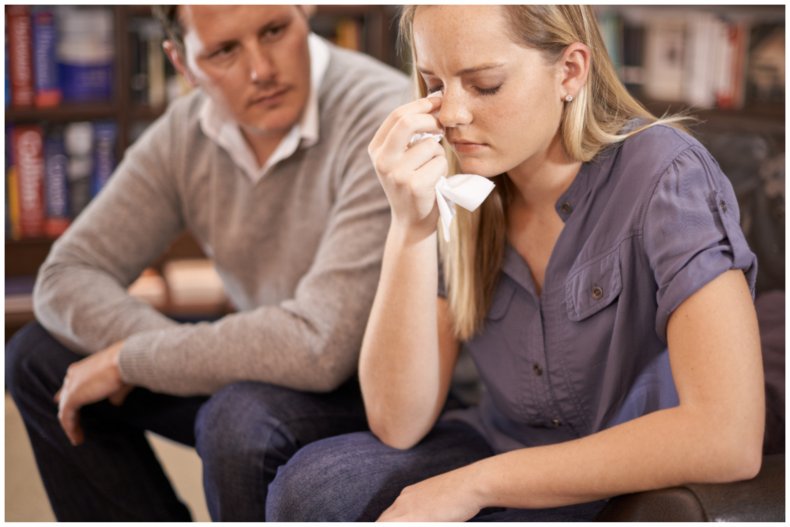 Stock image of upset woman and man