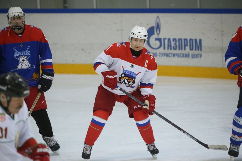 Putin playing ice hockey