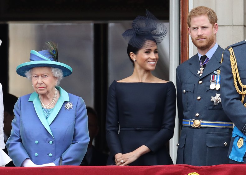 Queen with Harry and Meghan on Balcony