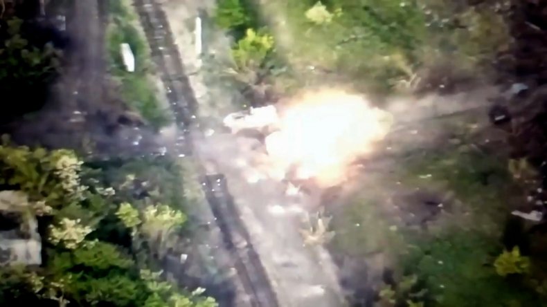 Armored Vehicle Blown Up By Ukrainian Ordnance as Russians Scurry, Video Shows