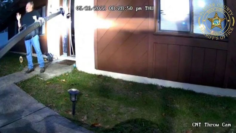 Mark Francioni steps out of his house