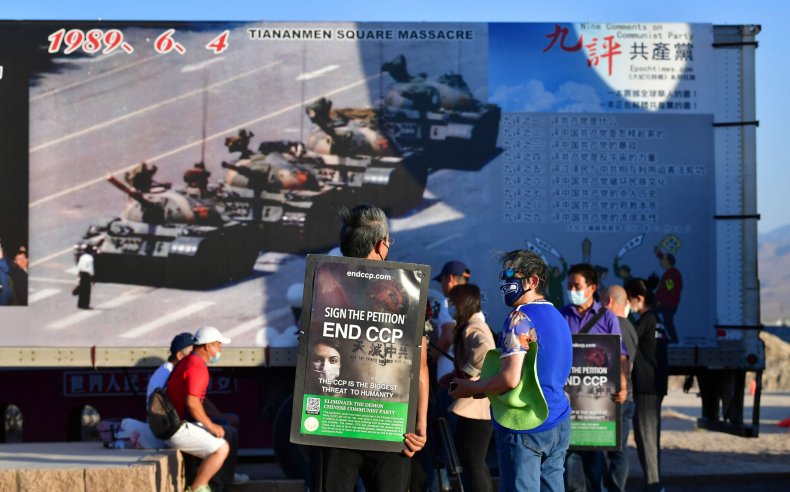 Activists carry petitions to end the CCP