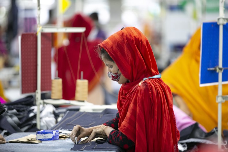 A garment worker works at a factory