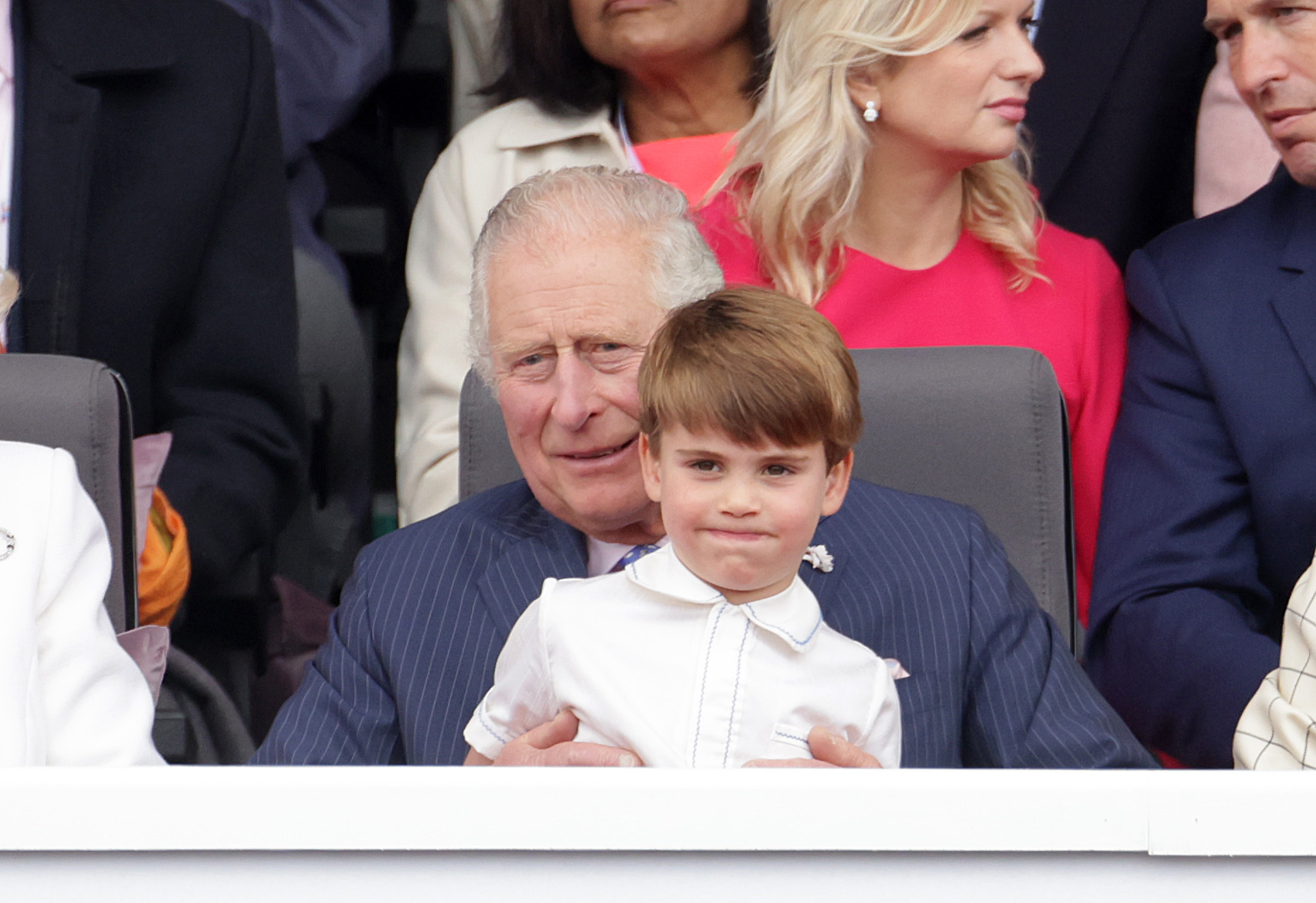 Prince Charles Bursts Out Laughing at Jubilee Parade in Viral Clip