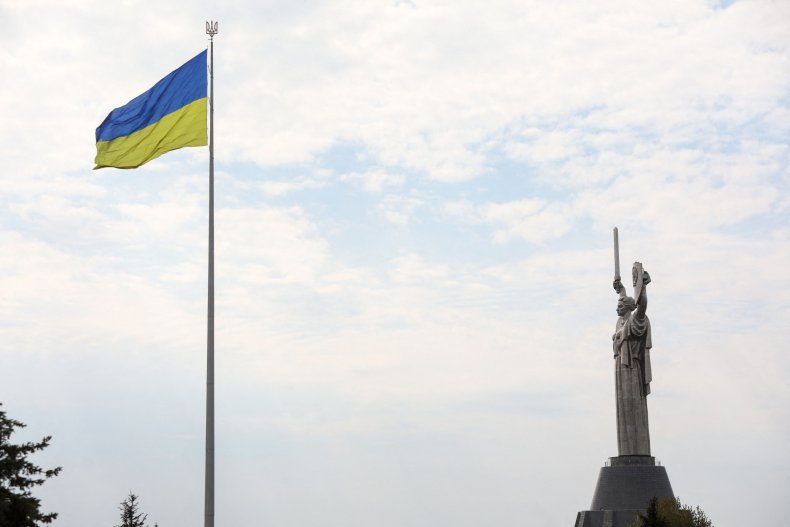 A Ukrainian flag waves