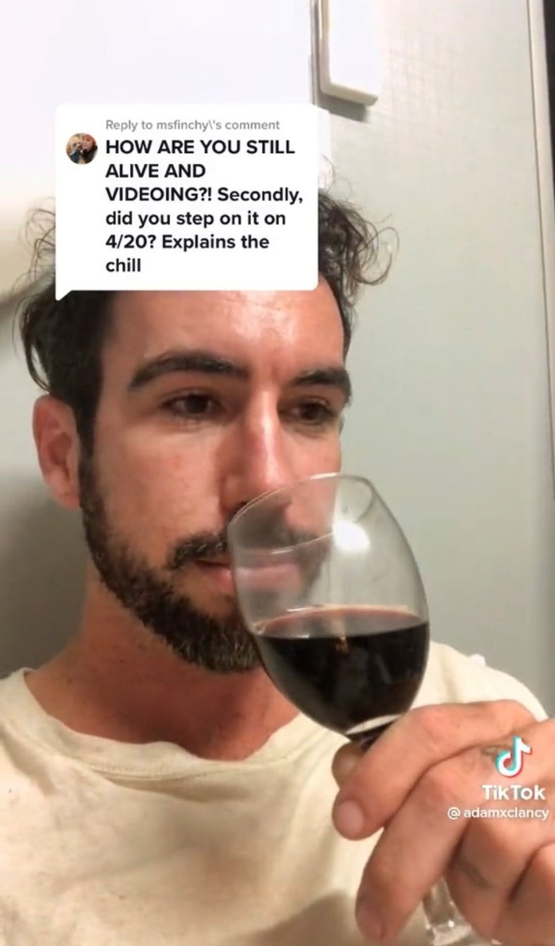 Adam Clancy drinking wine