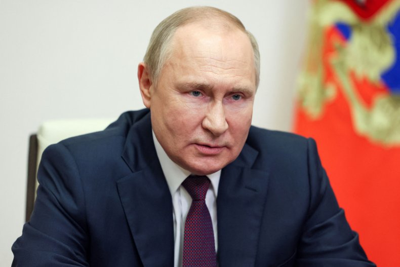 Vladimir Putin speaks on a vide conference