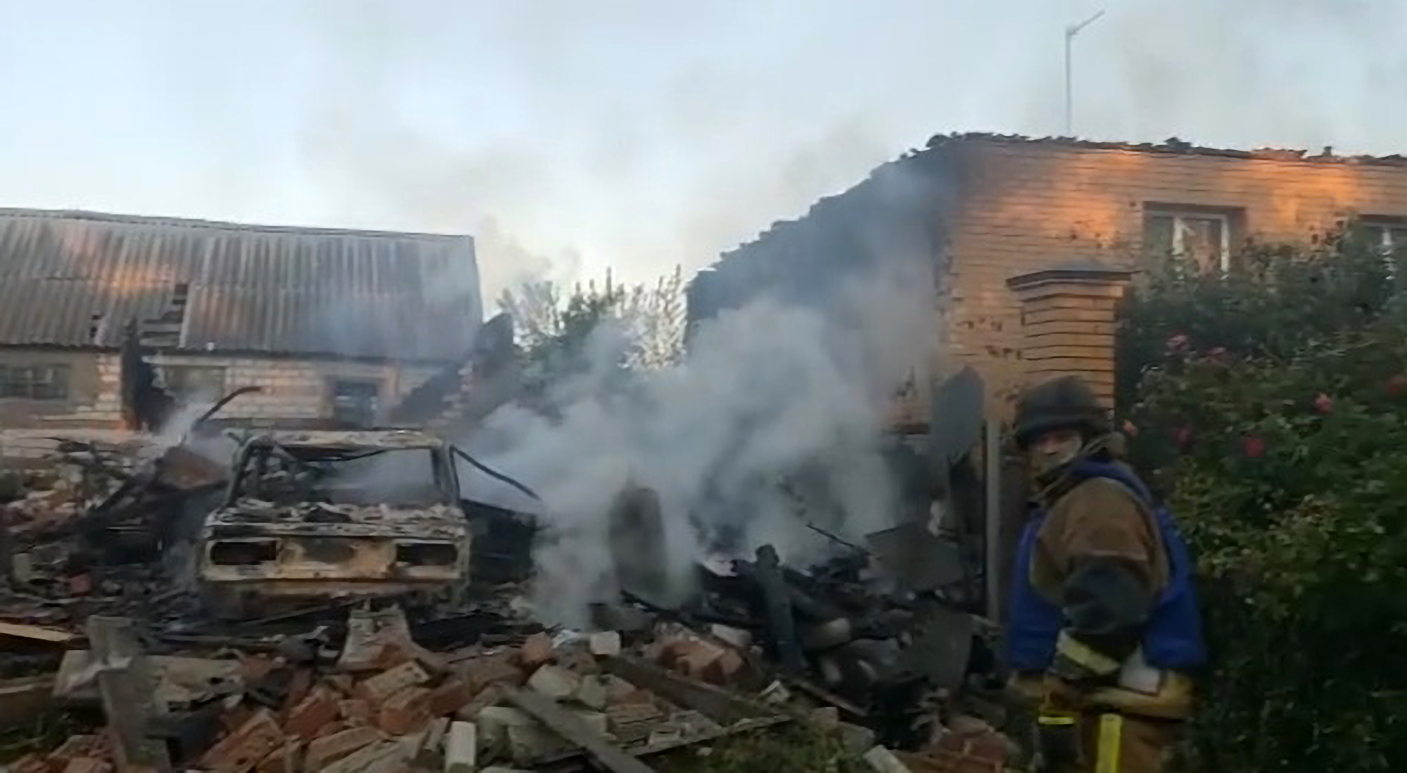 Ukrainian Emergency Workers Douse Fires After Russians Reportedly Bomb Residential Areas