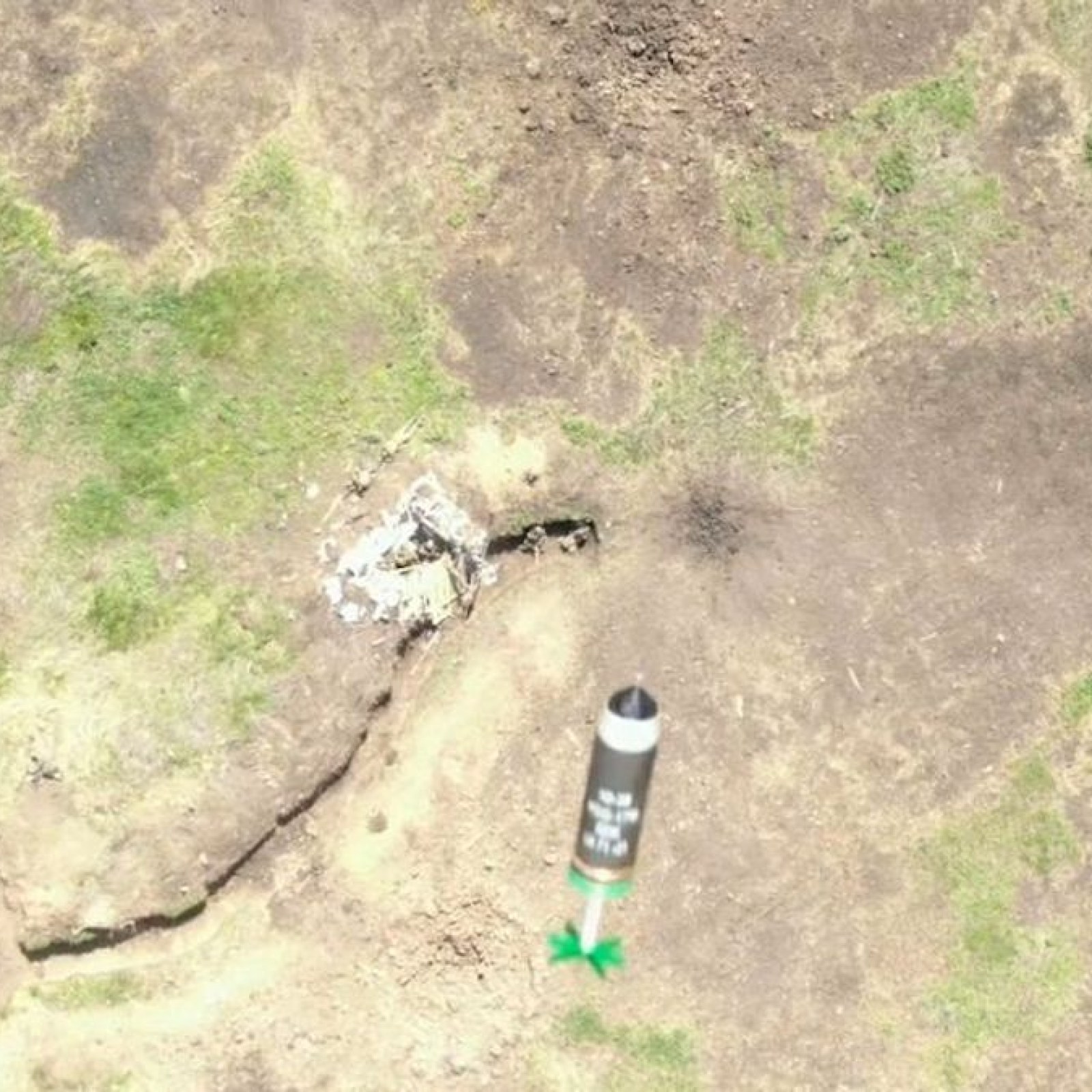 ukrainian-drone-drops-grenade-trench.jpg