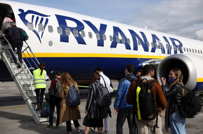 Passengers board Ryanair airplanes at Caravaggio.