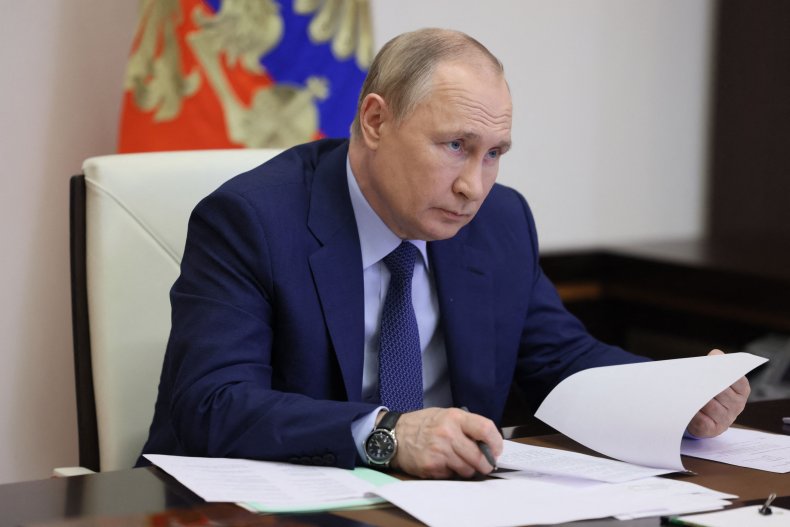 Russian President Vladimir Putin chairs a meeting 