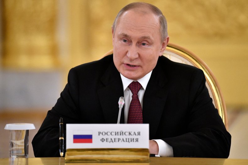 Vladimir Putin speaks during a conference 